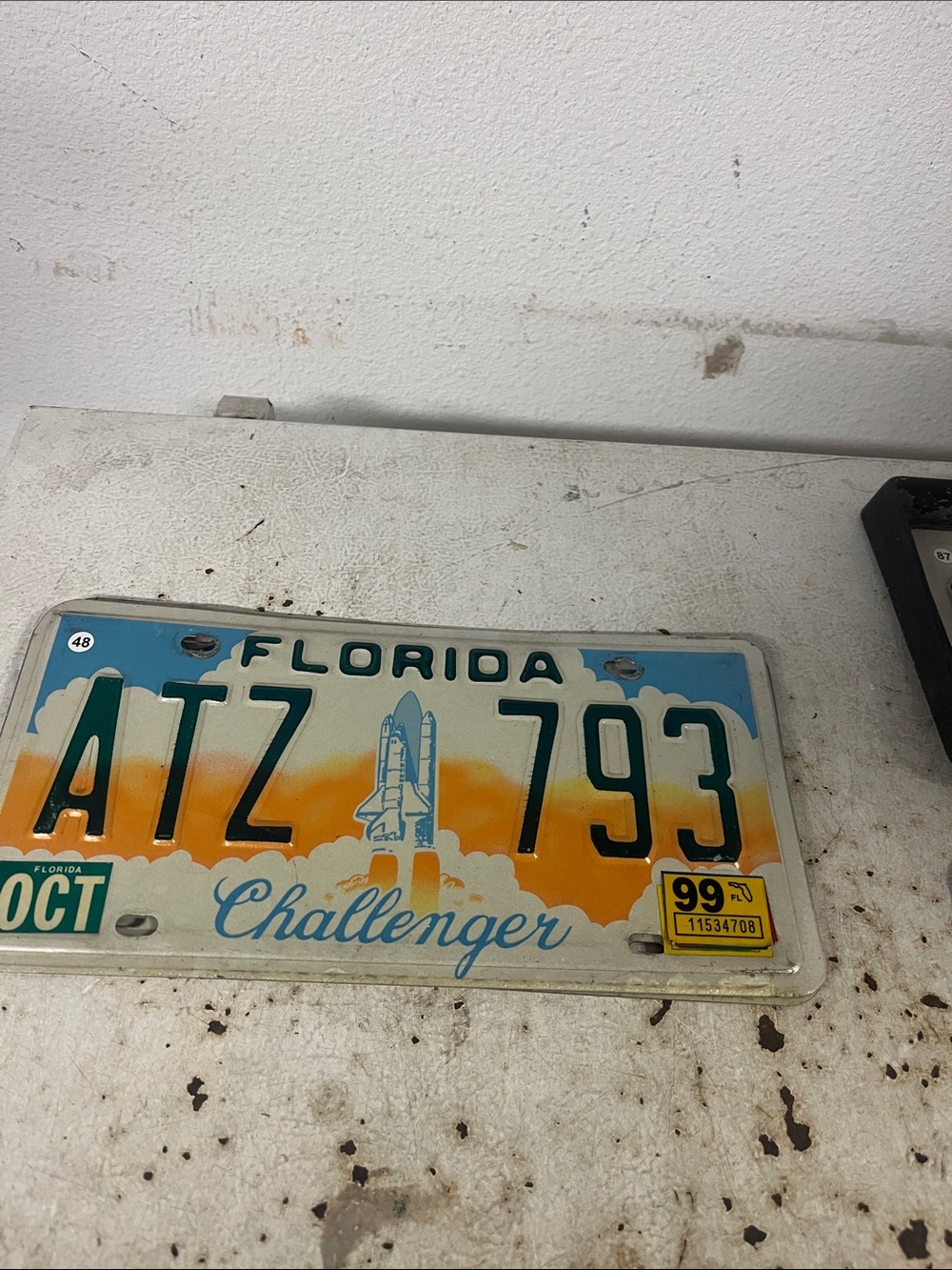 Item48…Florida Challenger License Plate - White, Blue & Orange